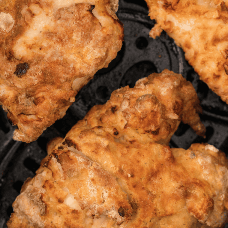 Air fryer Kentucky Kernel fried chicken cooked to golden brown and ready to serve