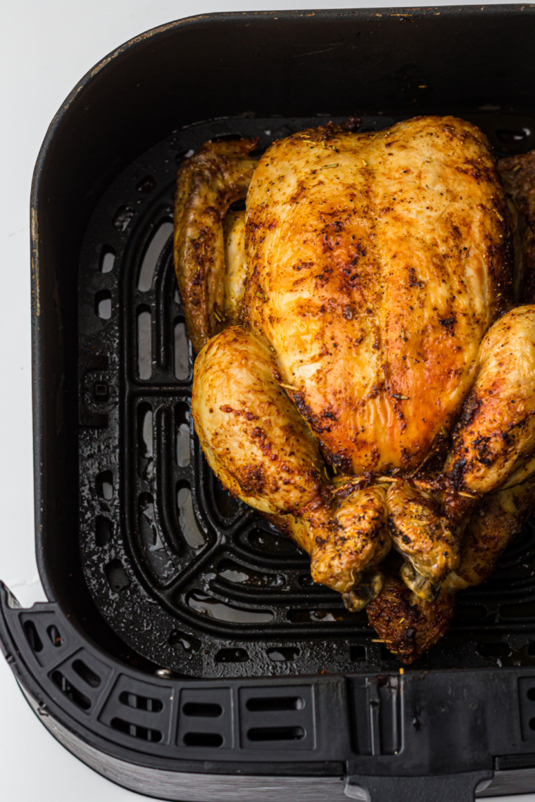 Air fryer roasted chicken with crispy skin and tender meat
