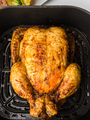 Whole chicken in air fryer with crispy golden skin