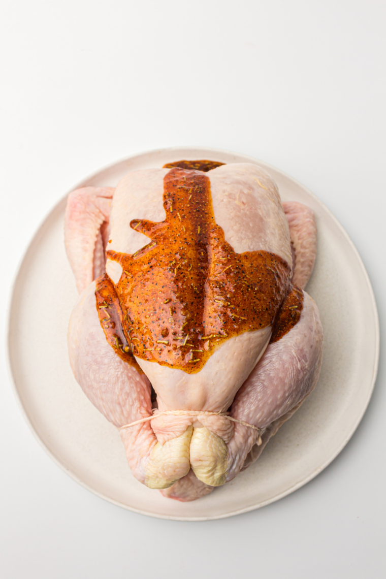 Pat whole chicken completely dry for crispy air fryer skin