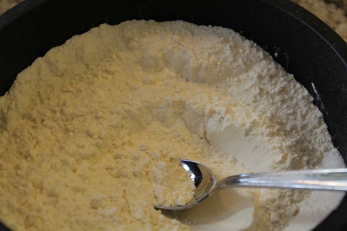 Flour In large Bowl, with mixing spoon.