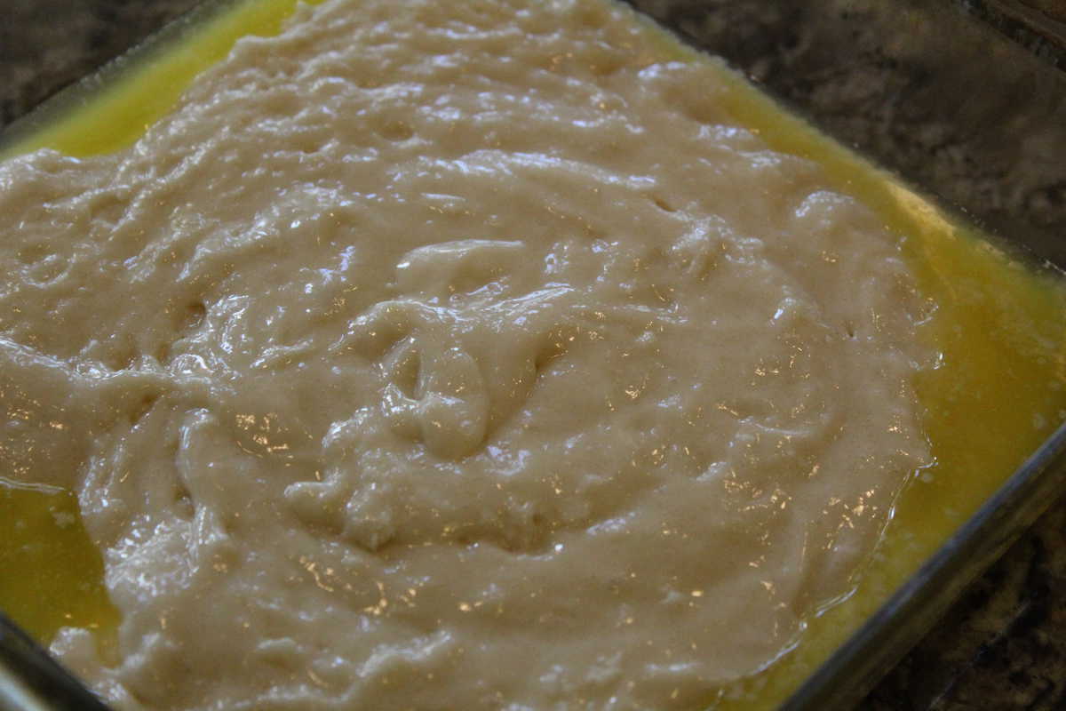 Pour Cake Batter into Prepared Pan (With Butter)