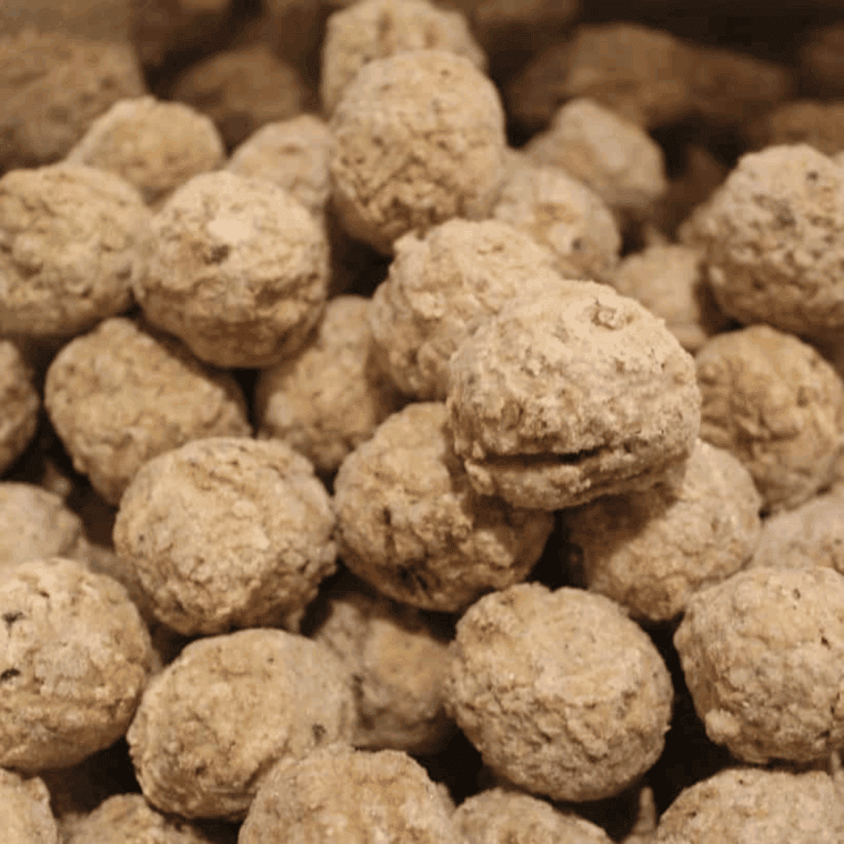 Place the frozen meatballs into the Instant Pot.