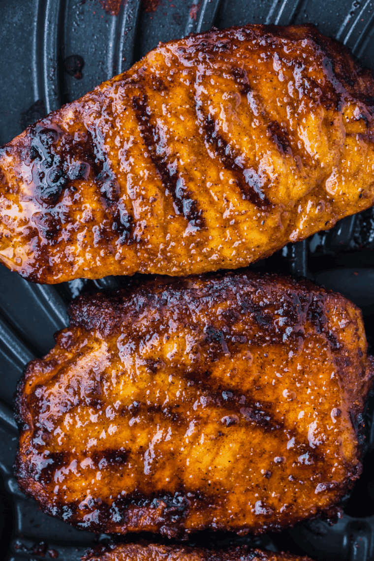 Golden, crispy Air Fryer Barbecue Pork Chops, brushed with barbecue sauce and ready to serve.
