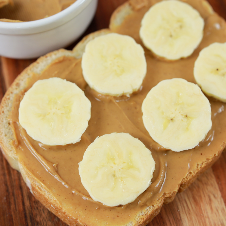 Golden crispy toast spread with warm peanut butter straight from the air fryer.