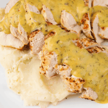 This Easy Copycat Cheddar’s Dijon Chicken and Mushrooms recipe brings restaurant flavor right to your kitchen. Juicy chicken breasts are smothered in a rich, creamy Dijon mushroom sauce for an easy, comforting dinner everyone will love.
