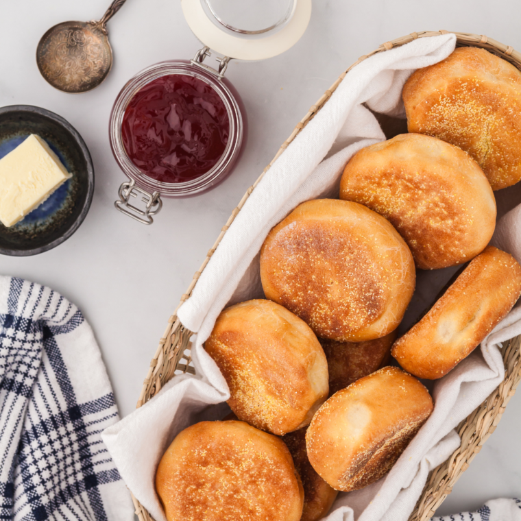 Air fried English muffin halves toasted to golden perfection in an air fryer.