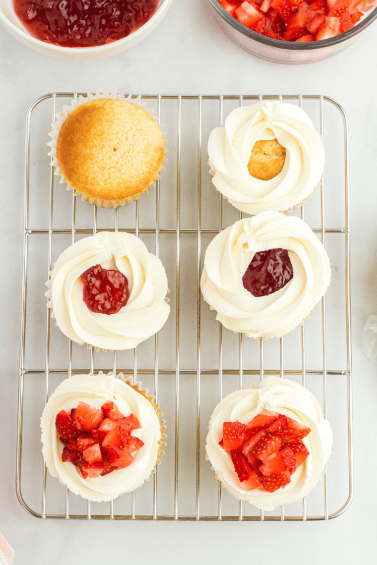 Golden, fluffy Air Fryer Homemade Yellow Cupcakes cooling on a wire rack, ready to frost and serve.