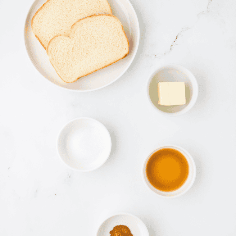 Air Fryer Cinnamon Toast ingredients: bread, cinnamon, sugar, butter, vanilla extract.