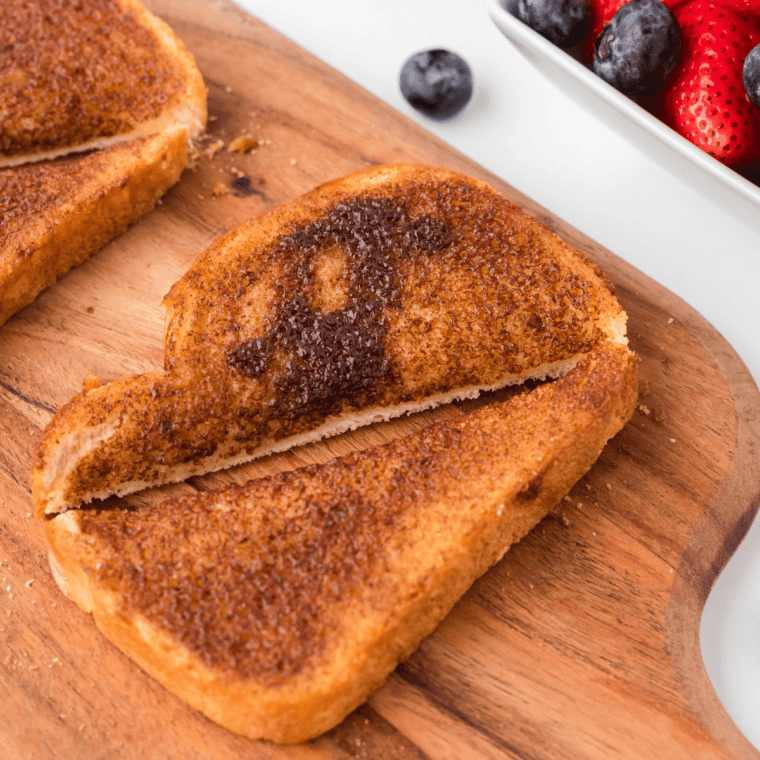 Golden and crispy Air Fryer Cinnamon Toast, freshly made with cinnamon sugar and butter.