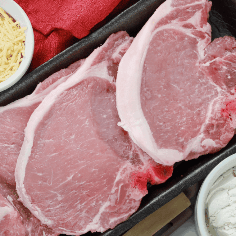 Ingredients needed for Easy Air Fryer Blackened Pork Chops on kitchen table.