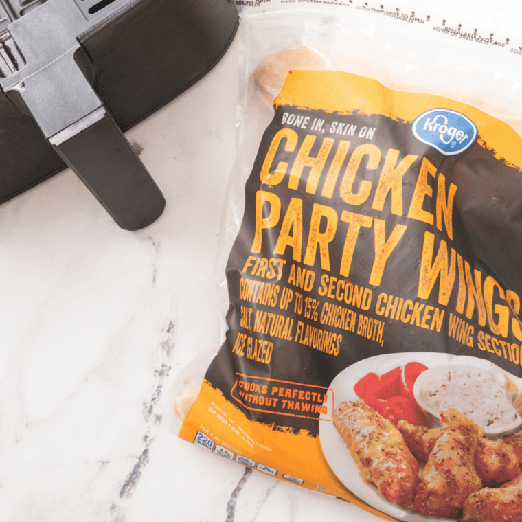Ingredients needed for Crispy Frozen Chicken Wings in Air Fryer (No Thaw, 25 Minutes!) on kitchen table.