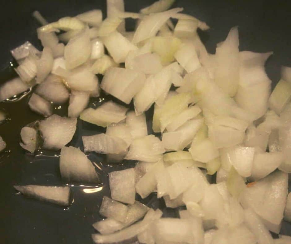 Add Diced Onions To Instant Pot Bowl to Saute.