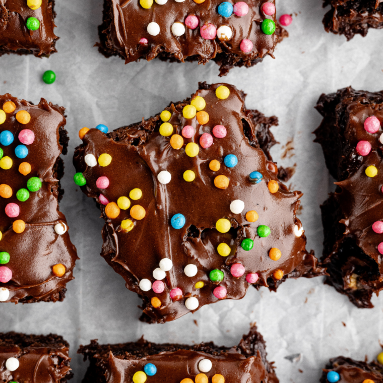 Homemade cosmic brownies with chocolate ganache and colorful candy-coated chocolate chips.