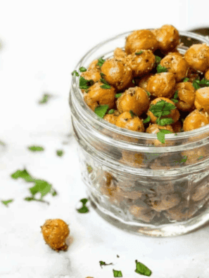 Crispy garlic and herb roasted chickpeas cooked in the air fryer, golden and seasoned.