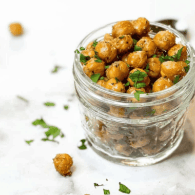Crispy garlic and herb roasted chickpeas cooked in the air fryer, golden and seasoned.