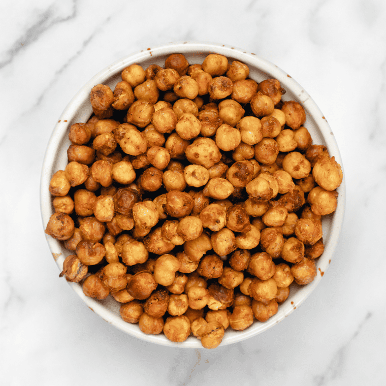 Bowl of crispy air fryer honey cinnamon roasted chickpeas