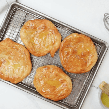 Golden air fryer Navajo fry bread puffed and crispy on plate