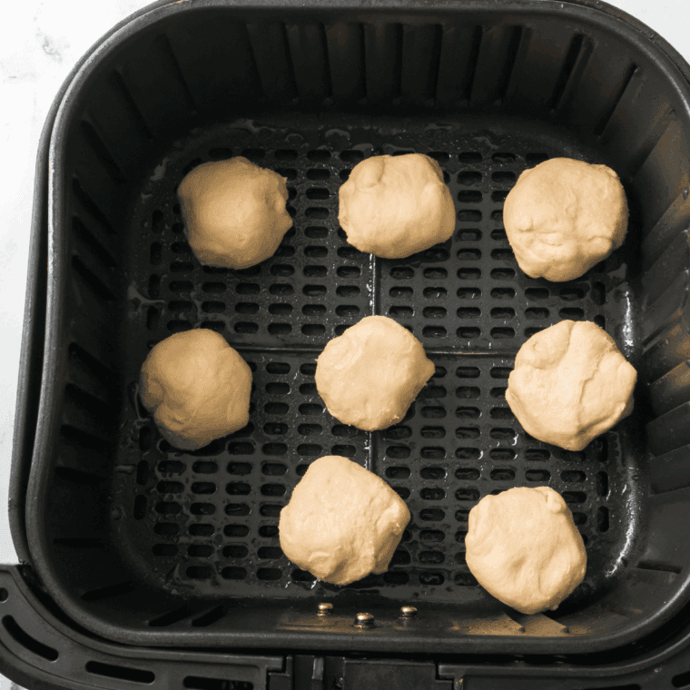 Place Snickers bars in the air fryer basket.