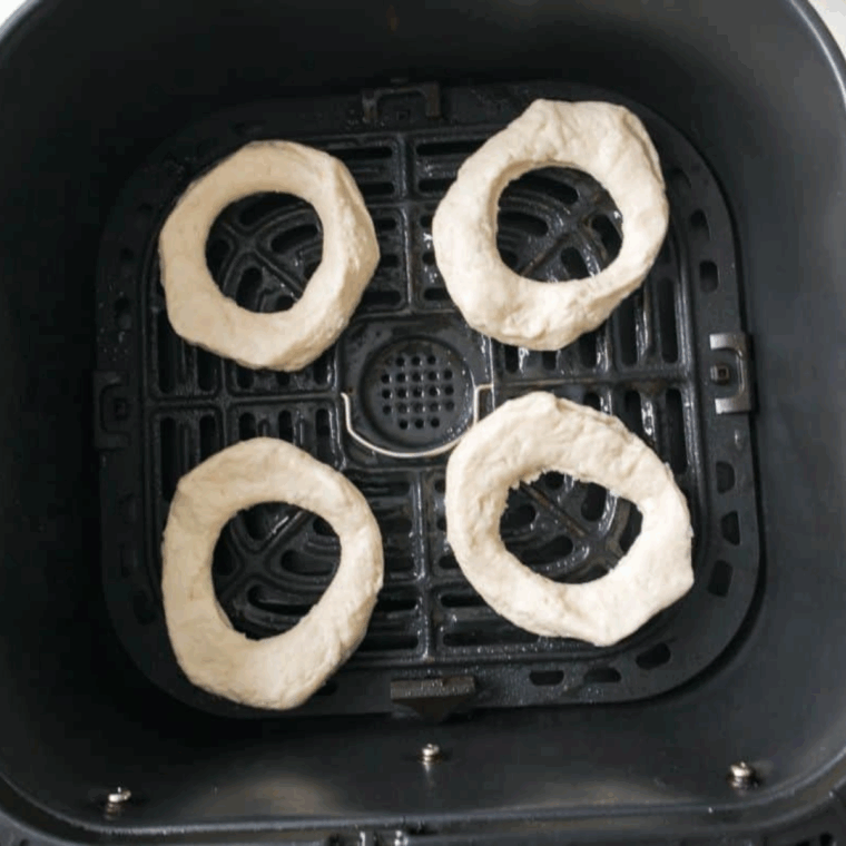 Place Dunkin Donuts Sprinkle Donuts Recipe in the air fryer basket.