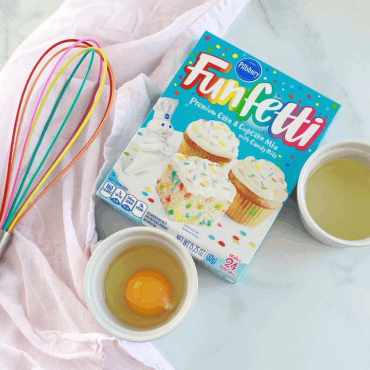 Ingredients needed for Air Fryer Cake Mix Donuts on kitchen table.