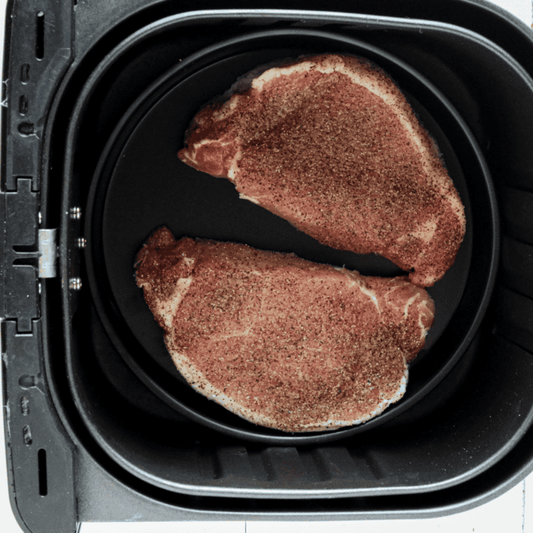 Chicago-Style Pork Chops in the air fryer basket.