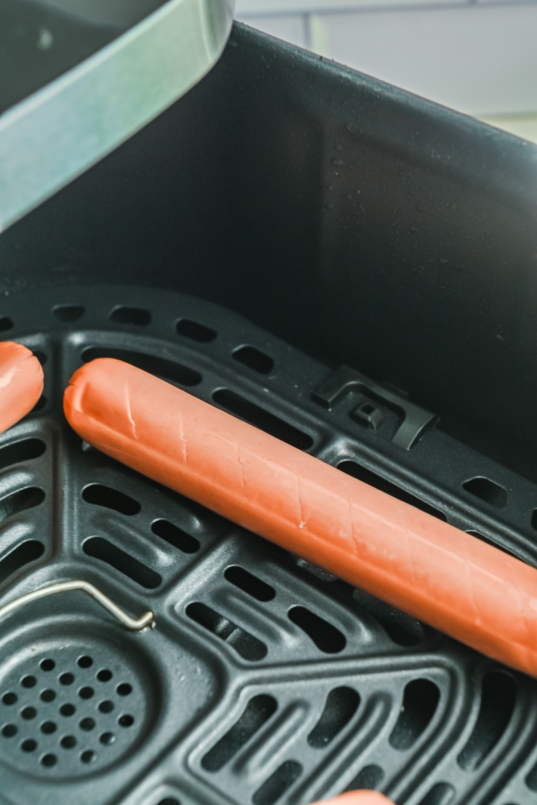 Air fryer preheated to 400&deg;F for quick hot dog cooking and crisping.