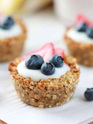 Air Fryer Oatmeal Bites on a plate with fresh fruit on the side