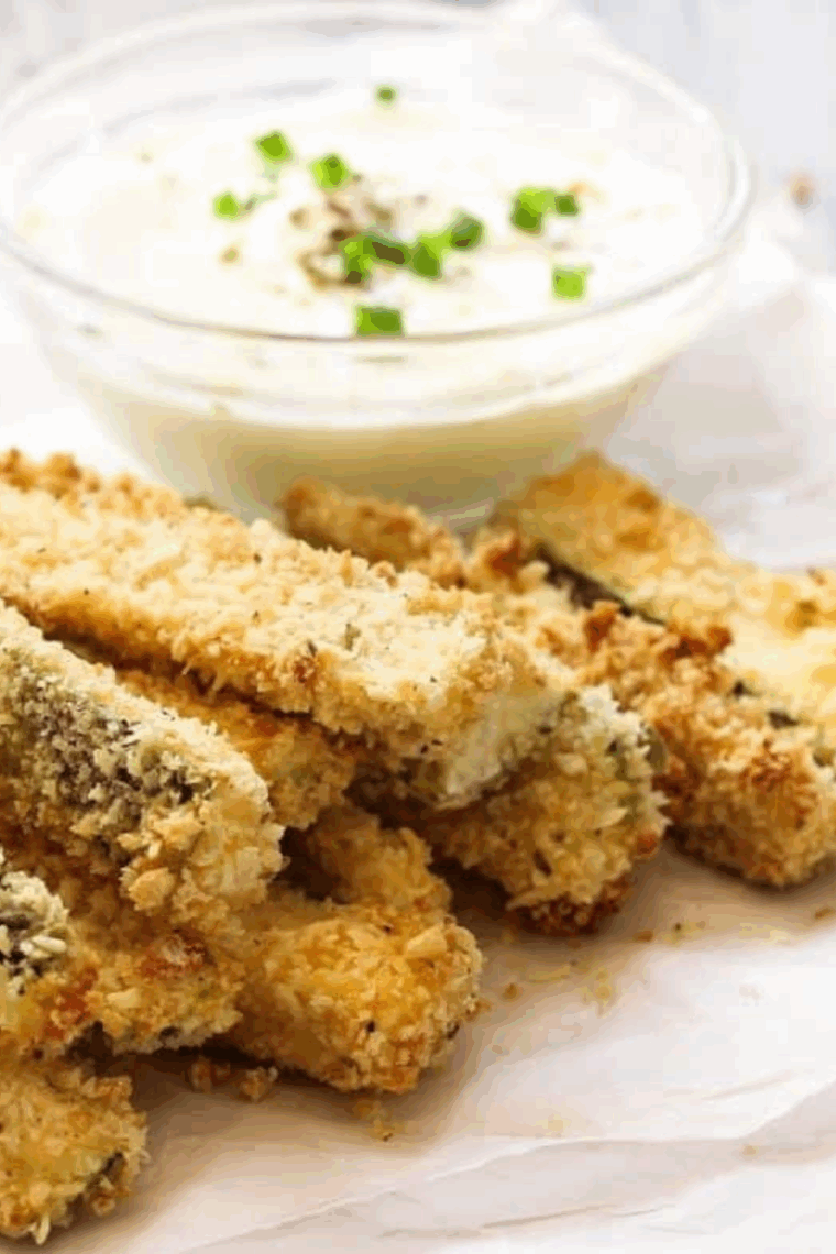 Homemade crispy zucchini fries seasoned and breaded like Red Robin’s favorite appetizer, served golden and delicious.