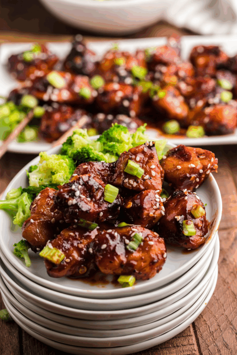 Close-up of sweet and spicy firecracker chicken bites ready to serve.