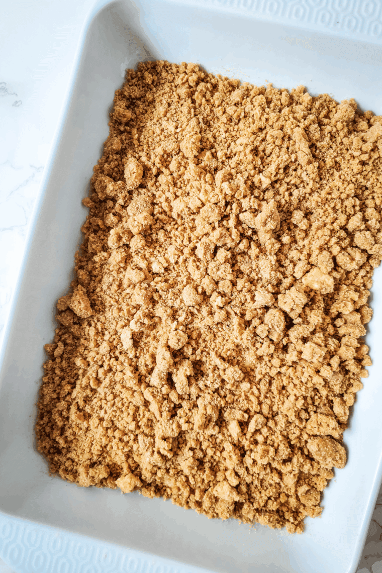 Baking coffee cake in oven until toothpick inserted in center comes out clean.