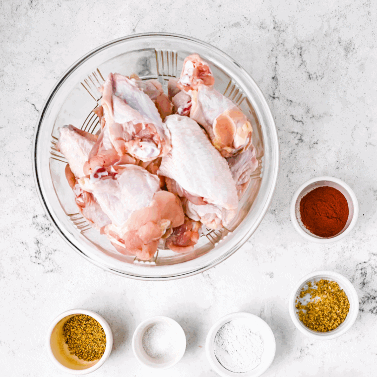 Ingredients needed for Air Fryer Chinese Salt and Pepper Chicken Wings on kitchen table.