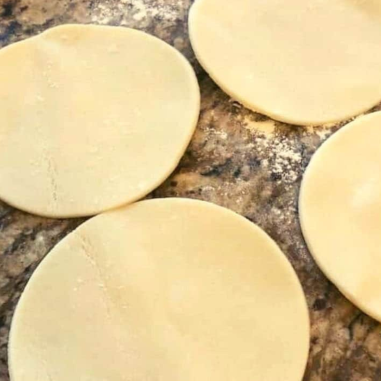 Step-by-step process of preparing lemon hand pies for the air fryer."