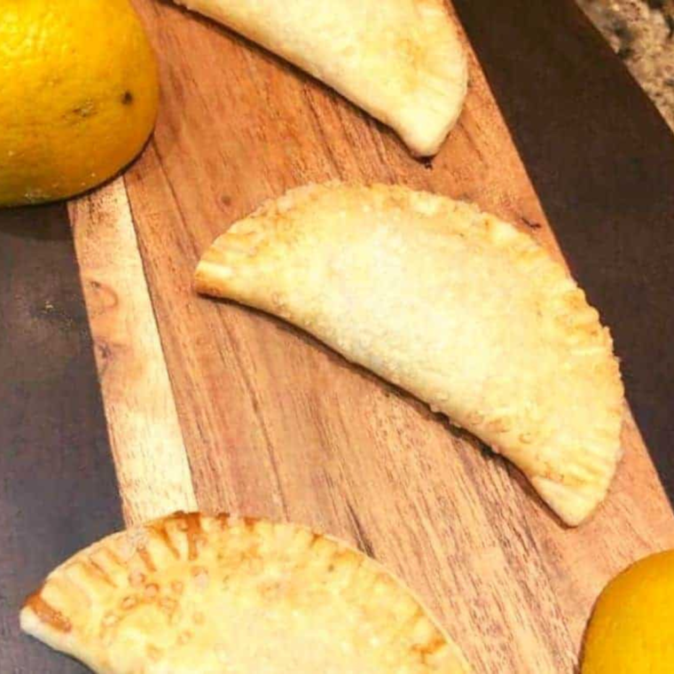 "Perfectly air-fried lemon hand pies with a golden, flaky crust."