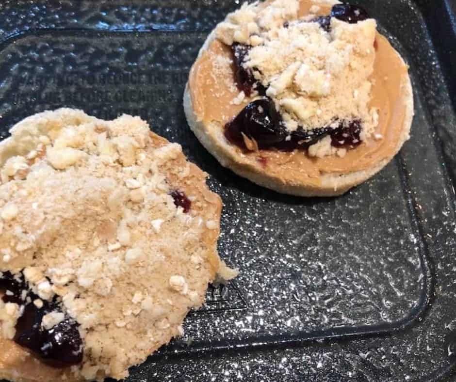 Air Fryer Peanut Butter & Jelly Streusel English Muffins on tray
