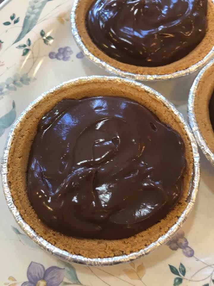 Let the pie shells cool quickly while you make the pudding, per directions on the package. Fill your pie shell with the prepared pudding.