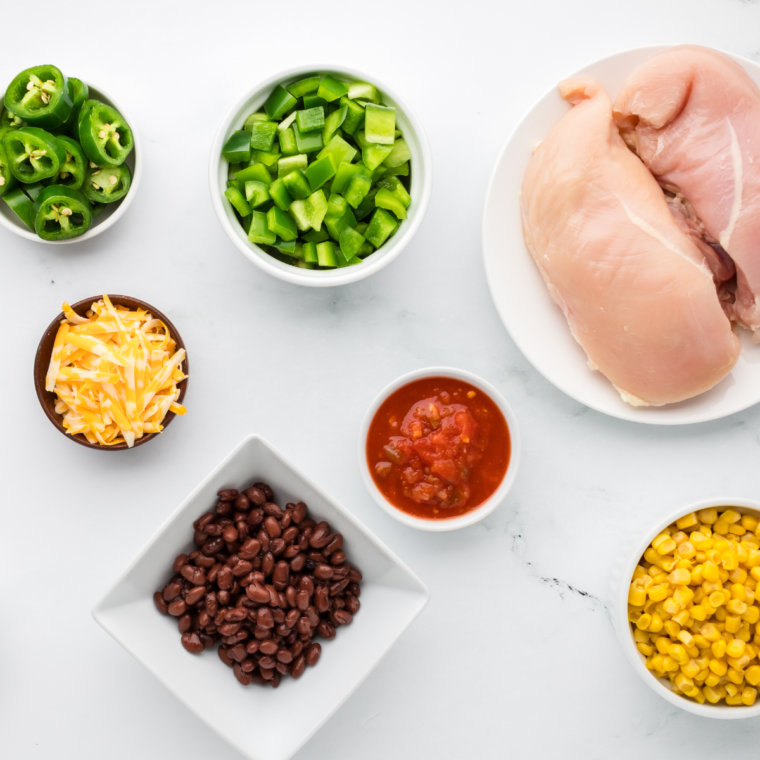 Ingredients needed for Air Fryer Mexican Chicken Foil Packet on kitchen table.