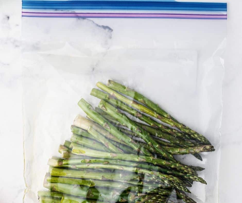 Asparagus Coated with Olive Oil and Seasonings in bag