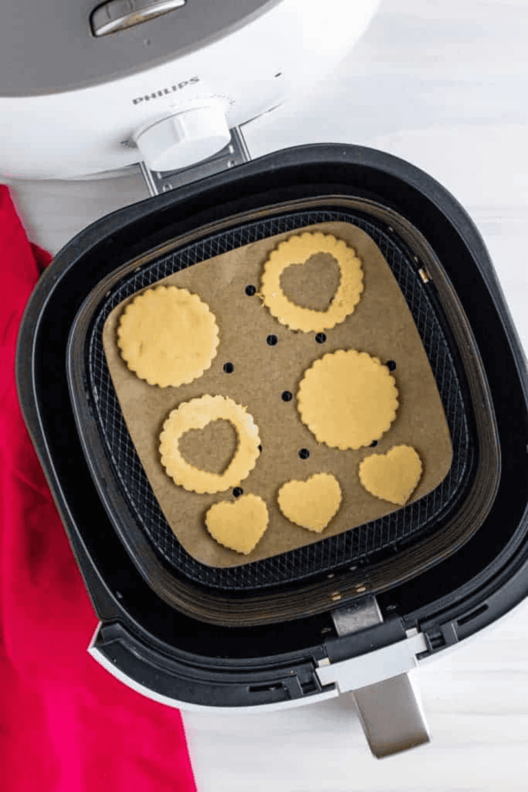Soft and chewy Betty Crocker sugar cookies baked in an air fryer, golden and ready to serve.