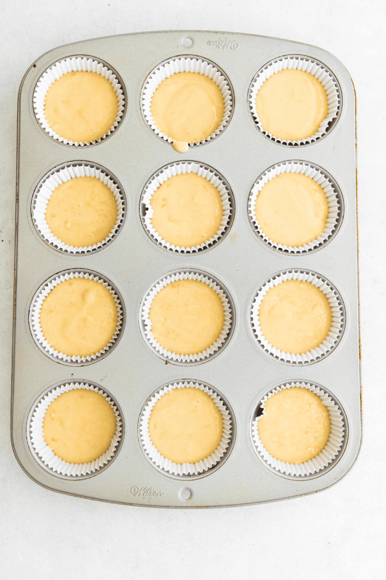 Fill the Cups &ndash; Pouring batter into muffin cups, filling about two-thirds full.