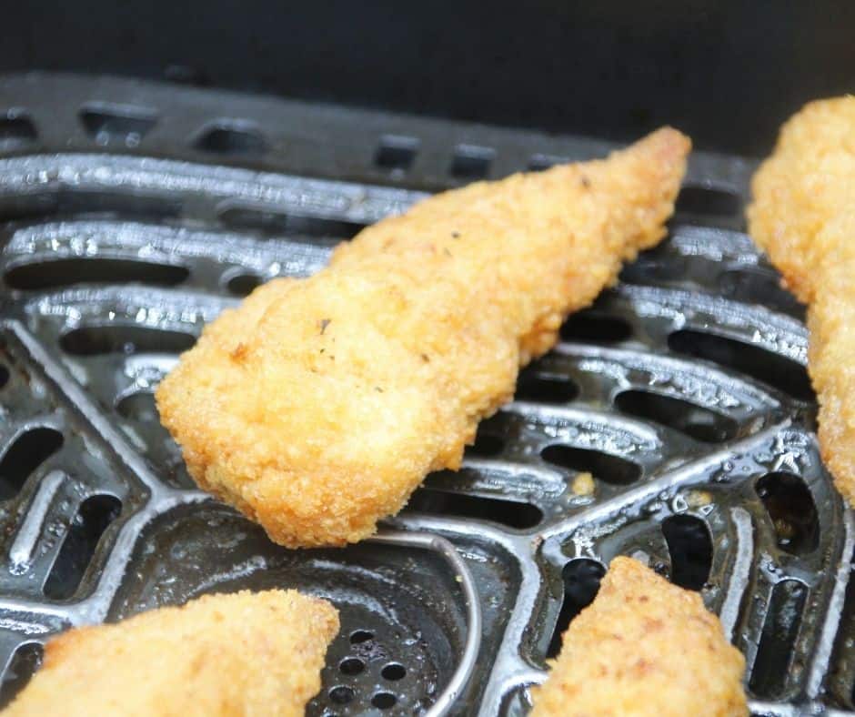 Finish your tender, and then set them in the air fryer for 370 degrees F, for 7 minutes after 7 minutes, flip and air fry for another 7 minutes. being sure to coat them in olive oil spray, when you first put them in the air fryer and after, when you flip them.