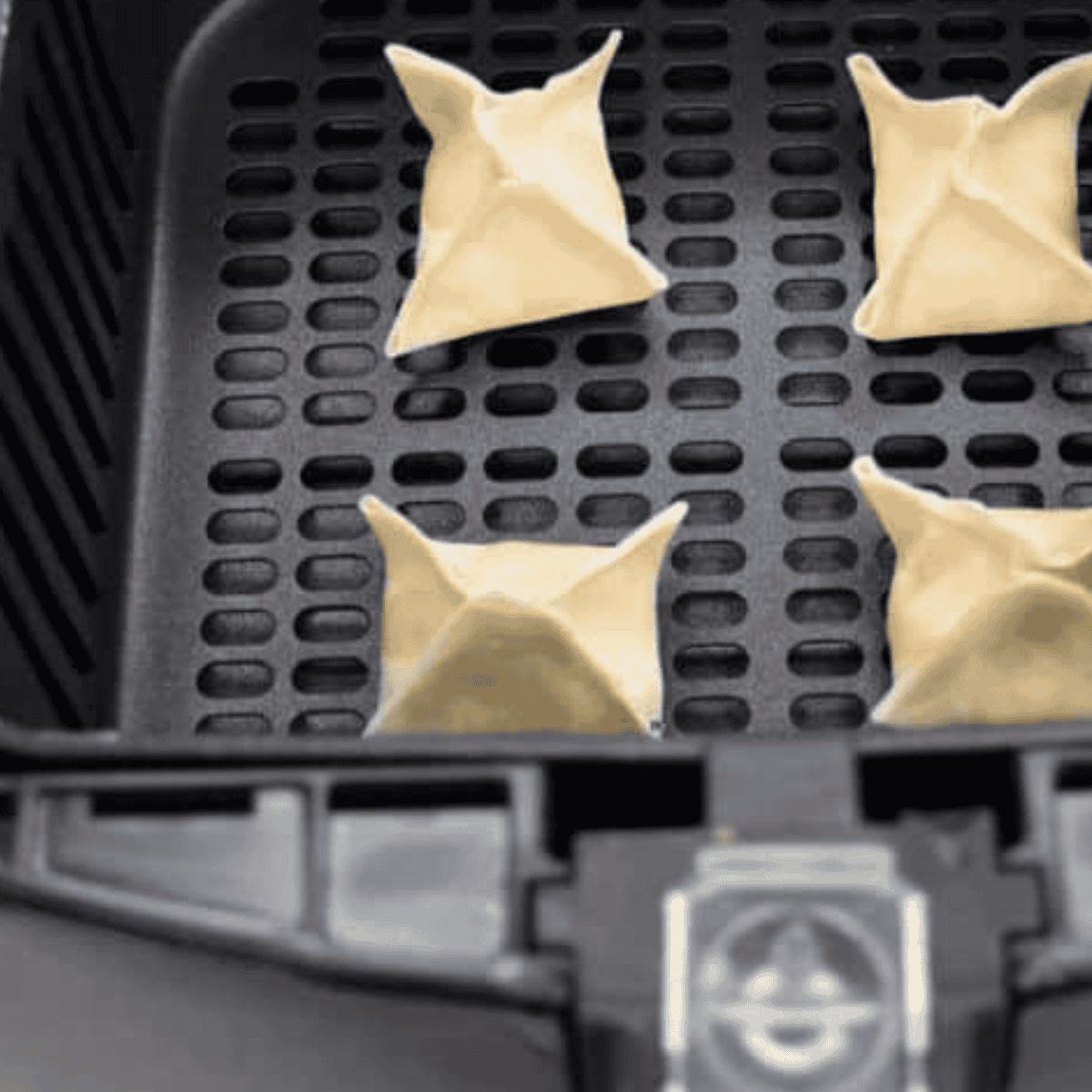 Place P.F. Chang’s Crab Rangoons in the air fryer basket.