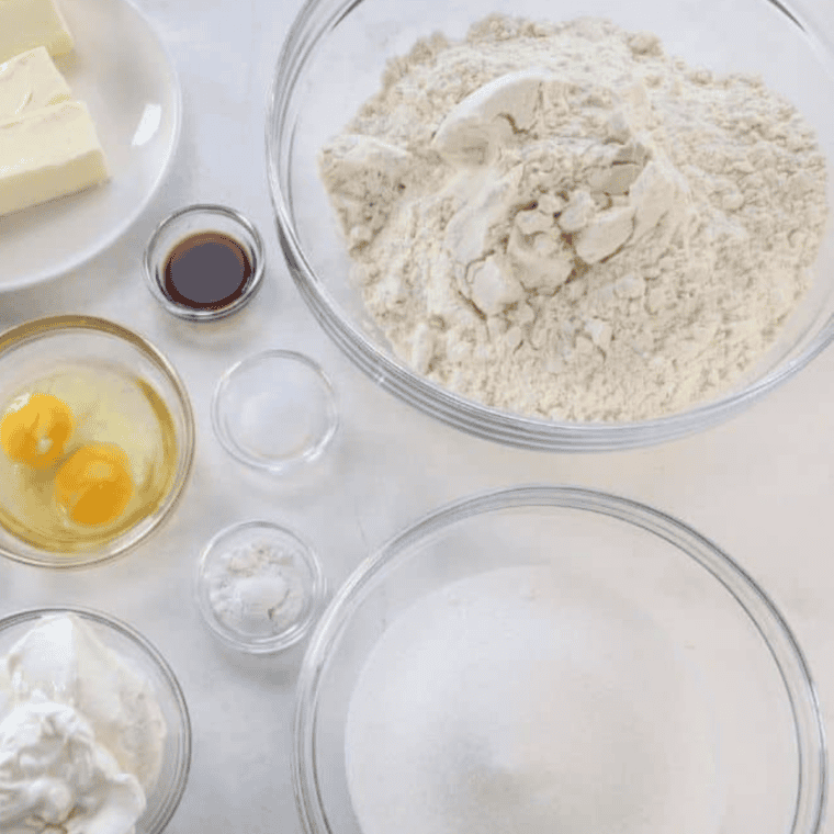 Ingredients needed for Scrumptious Air Fryer French Vanilla Cake Mix Cookies on kitchen table.