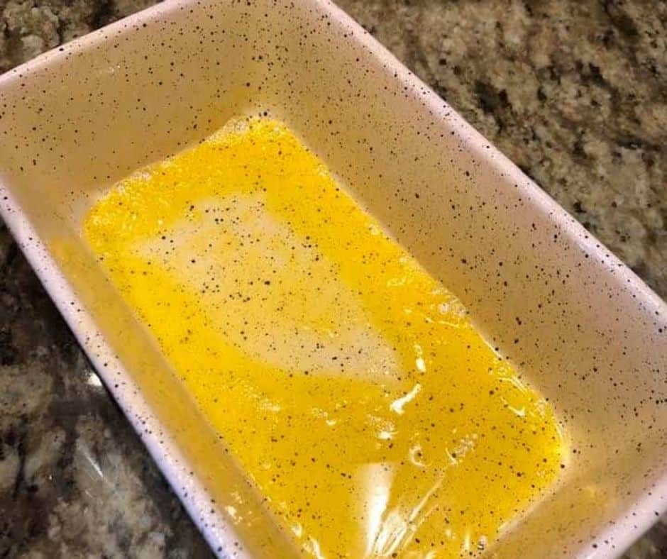 Spray your loaf pan with cooking spray.