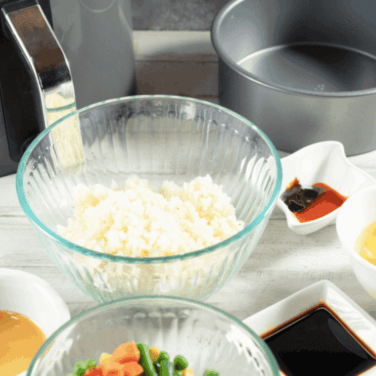 Benihana Garlic Chicken Cauliflower Fried Rice Recipe ingredients on kitchen table.