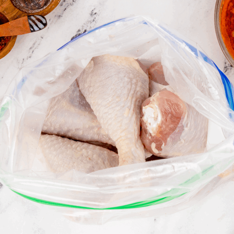 Coat the chicken legs with the BBQ sauce.