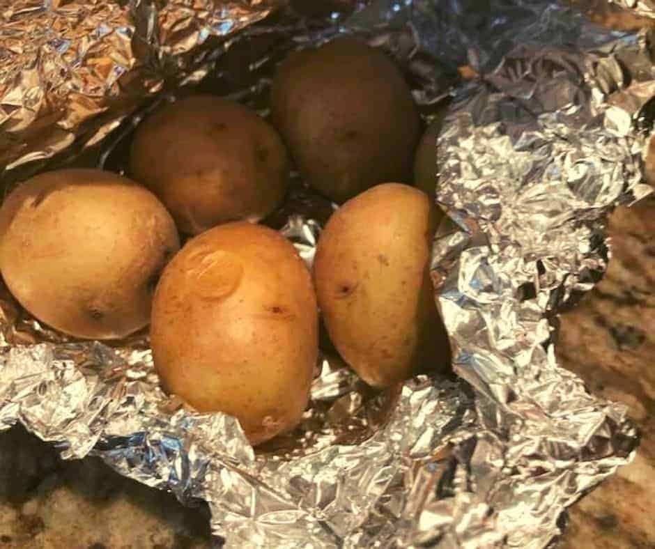 closeup: potatoes in foil to make my mashed potatoes air fryer recipe