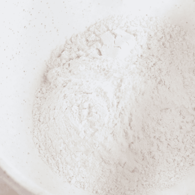 Whisking flour, baking soda, and salt together in a medium bowl.