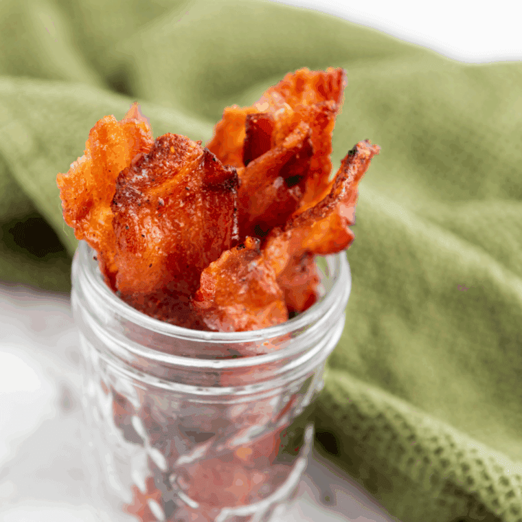 Air Fryer Bourbon Candied Bacon: Crispy bacon glazed with bourbon and brown sugar, air-fried to a perfect sweet and smoky finish.