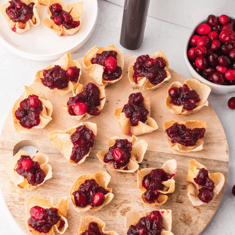 Air Fryer Cranberry Brie Bites with creamy brie, cranberry sauce, and crispy wonton wrapper.